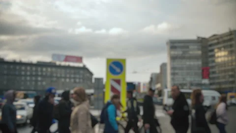 Lens blur, out of focus. A stream of cars, a busy street. A crowd of pedestrians Stock Footage 142151195