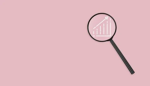 Lens with Chart on Pink Background close up Stock Photos