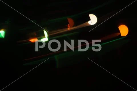 Lens flare background, motion blurred bokeh Stock Photos