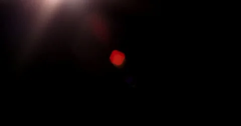 Lens Flare on Black Stock Footage 75078112