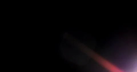 Lens Flare on Black Stock Footage 75078173
