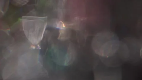 Lens flare coating with crystal clear and golden bokeh video Stock Footage 317478246