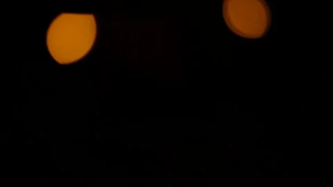 Lens flare effect on black background yellow Video stock 145440655