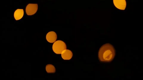 Lens flare effect on black background yellow Stock Footage 145440675