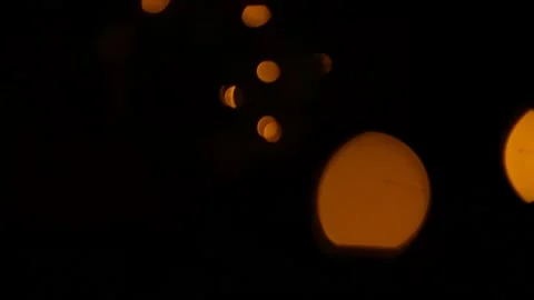 Lens flare effect on black background yellow Stock Footage 145440709