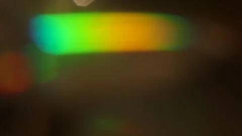Lens flare effect on black background yellow Stock Footage 145440725
