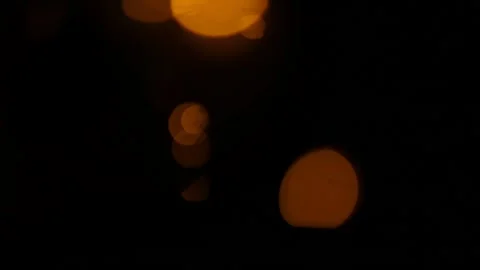 Lens flare effect on black background yellow Video stock 145440737