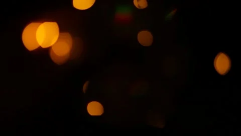 Lens flare effect on black background yellow Stock Footage 145440761