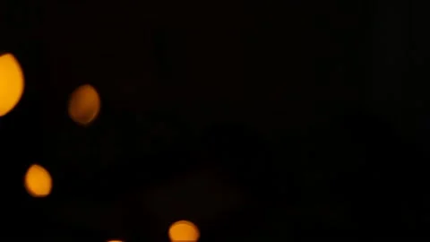 Lens flare effect on black background yellow Stock Footage 145440767