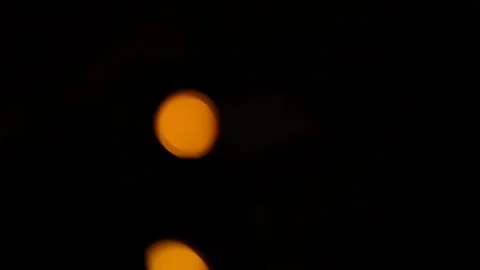 Lens flare effect on black background yellow Video stock 145440780