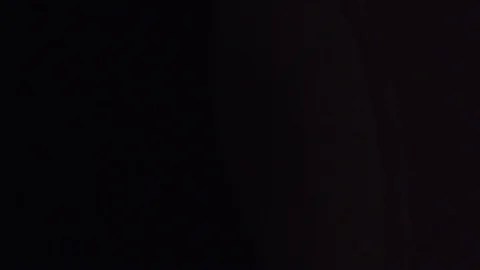 Lens flare effect, the light source is out of shot and moves from side to side Stock Footage 114061035