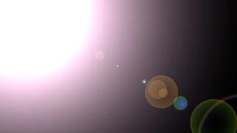 Lens flare effect shining in a dark background ideal for overlays Stock Footage 335966561