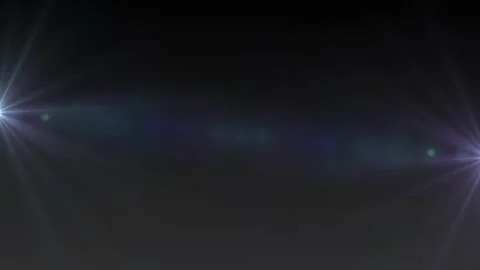 Lens flare effects on black background | Stock Video | Pond5