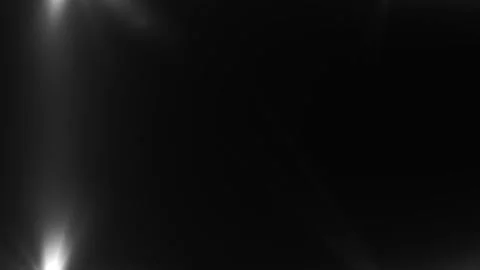 Lens flare effects on black background | Stock Video | Pond5