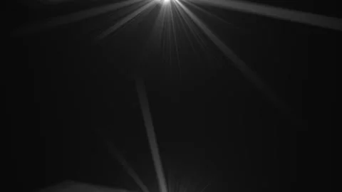 Lens flare effects on black background | Stock Video | Pond5