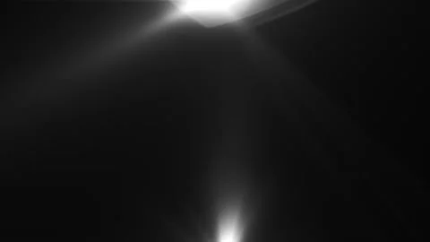 Lens flare effects on black background | Stock Video | Pond5