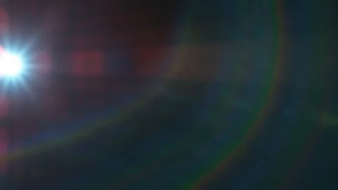 Lens flare light and bright glow moves horizontally on black background. Stock-Footage 122737439