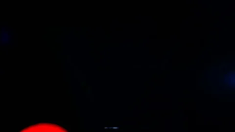 Lens flare light and bright glow over black background. Abstract overlay filter Stock Footage 122743084