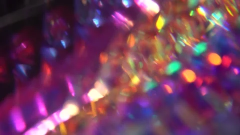 Lens flare. The light through the crystal facets flashes with multicolored Stock Footage 212230258