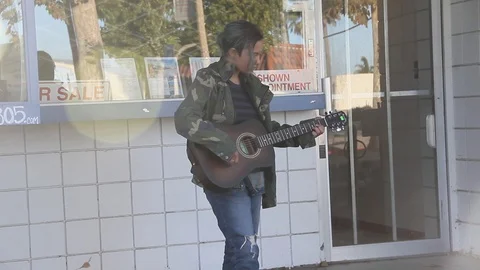 Lens flare over kid playing music Stock Footage 122724211
