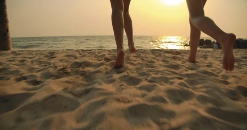 Lens flare, Slow motion: Close up Women friends running enjoy life Видео 123637605