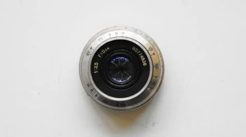 Lens from an old camera. Stock Photos