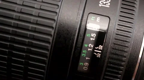Lens rotating, looking for a proper distance scale Stock Footage 68440534