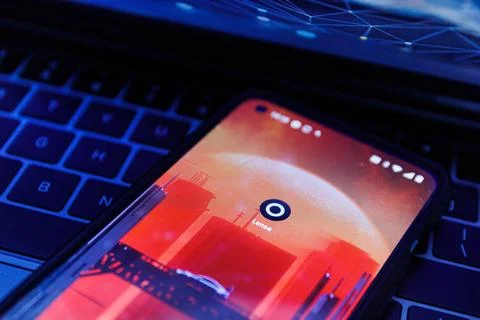 Lensa application on smartphone. Lensa app uses AI to make magic avatars Stock Photos