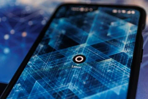 Lensa application on smartphone. Lensa app uses AI to make magic avatars Stock Photos