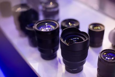 Lenses stand vertically in the window. soft focus side view 스톡 사진