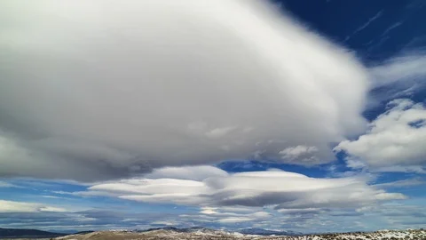 Lenticular Cloud Time Lapse over the Snow Covered Nevada Desert Near Reno Stock Footage 103489049