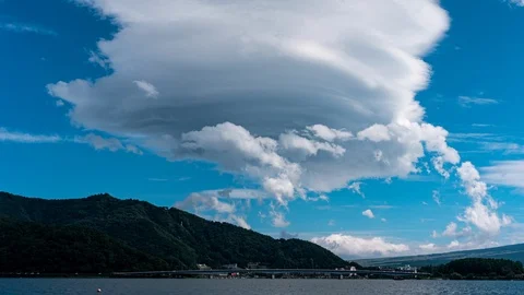 Lenticular Clouds over a Bridge (time lapse) Stock Footage 115094780