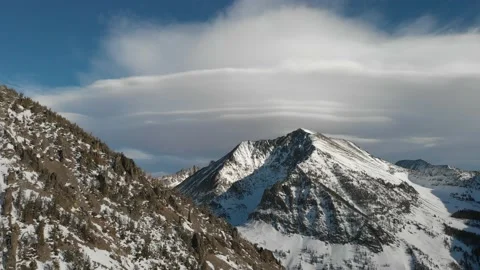 Lenticular clouds over peak Stock Footage 166553409