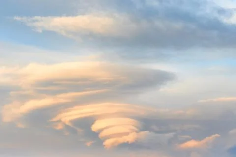 Lenticular clouds at sky