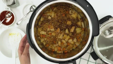 Lentil and vegetable stew cooked in multi cooker Stock Footage 140713258