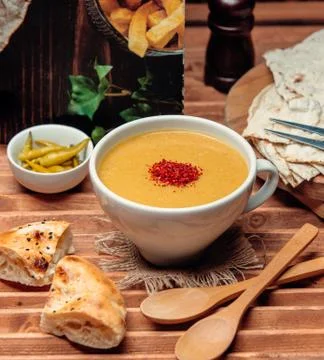 Lentil soup with bread on the table 1 Stock Photos