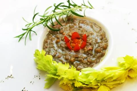 Lentil with a tomato Stock Photos