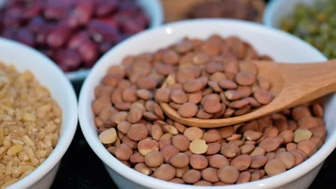 Lentils in a bowl, close-up. Video stock 246404888