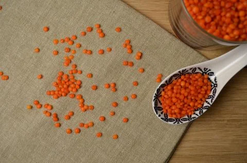 Lentils in the dishes on the table. Stock Photos