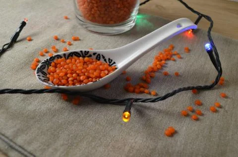 Lentils in the dishes on the table. Stock Photos