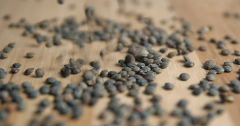 Lentils falling rotating studio macro 스톡 동영상 101476043