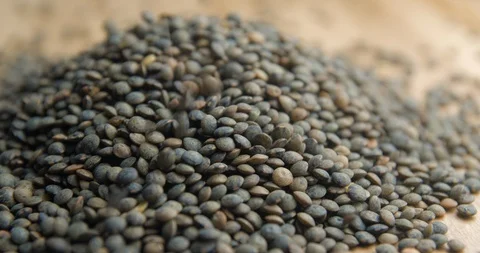 Lentils falling rotating studio macro Видео 101476384