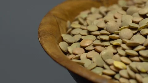 Lentils. Heap of raw uncooked brown lentils Video stock 102412958