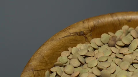 Lentils. Heap of raw uncooked brown lentils Video stock 102413247