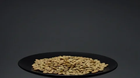 Lentils. Heap of raw uncooked brown lentils Video stock 102458623