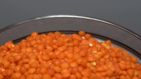 Lentils. Heap of raw uncooked red lentils in bowl. Stock Footage 102460661