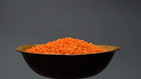 Lentils. Heap of raw uncooked red lentils in bowl. Stock Footage 102478073