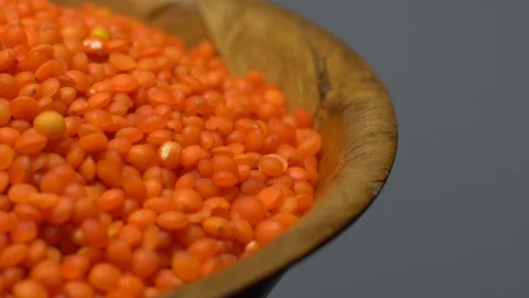 Lentils. Heap of raw uncooked red lentils in bowl. Stock Footage 102478315