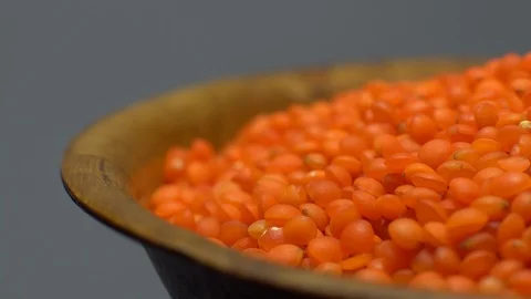Lentils. Heap of raw uncooked red lentils in bowl. Stock Footage 102478426