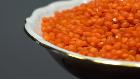 Lentils. Heap of raw uncooked red lentils in bowl. Stock Footage 102478598